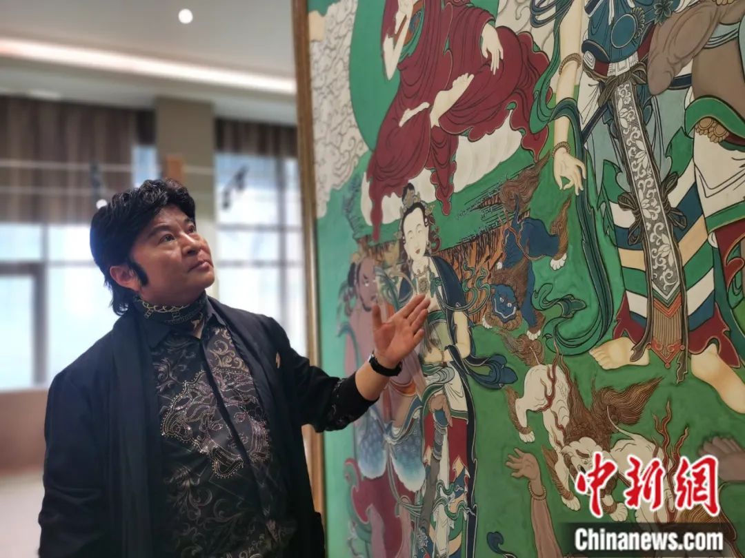 國家一級美術(shù)師劉觖。張?zhí)砀?攝