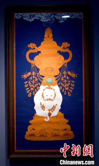 圖為5月16日，展覽中的新創(chuàng)唐卡作品《瑞象承香》?！±盍?攝